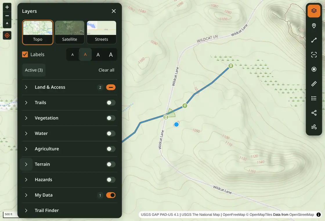 Free Hunting Map Layers panel beside a Wisconsin topo map, with layer categories and basemap controls.